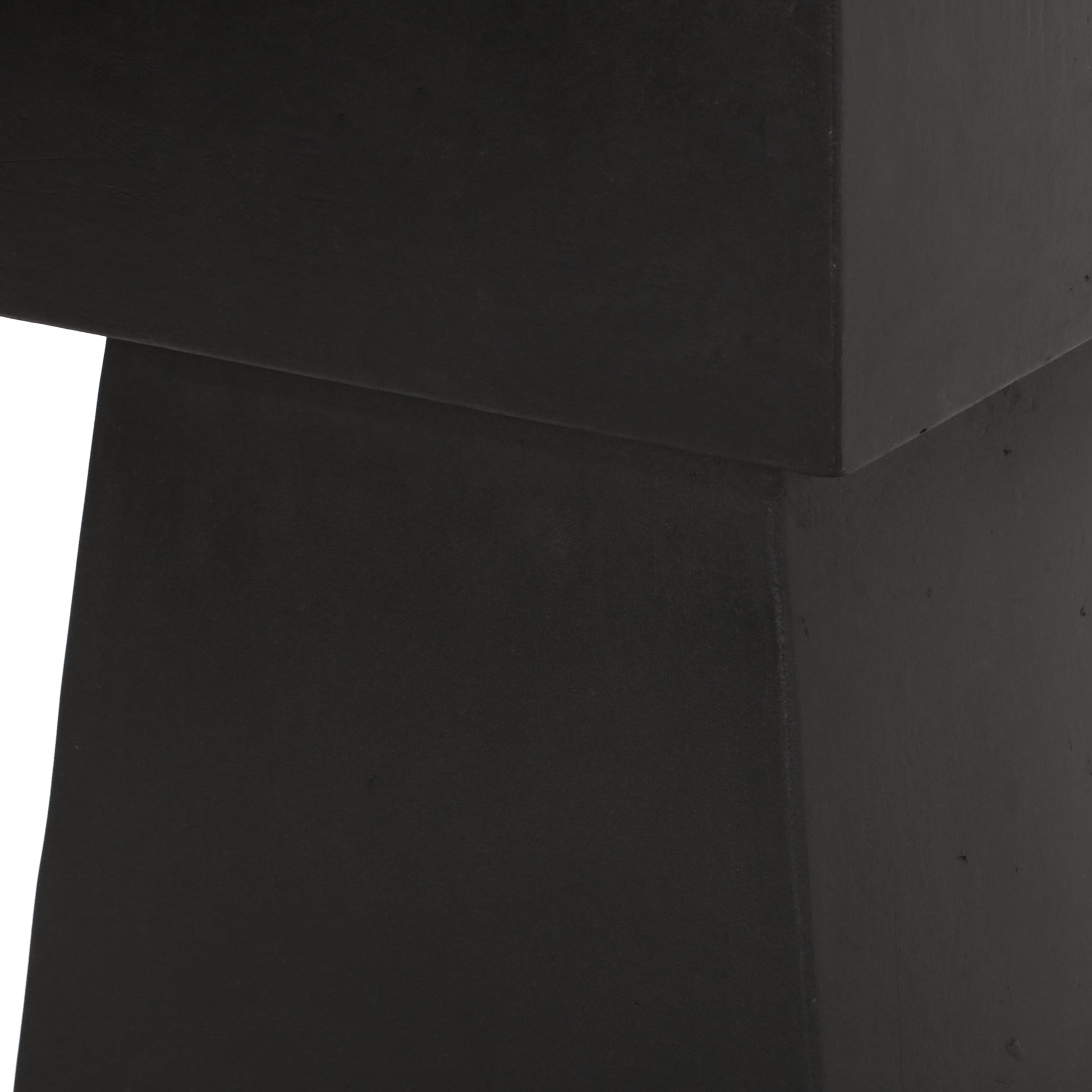 Modern black abstract sculpture with geometric shapes