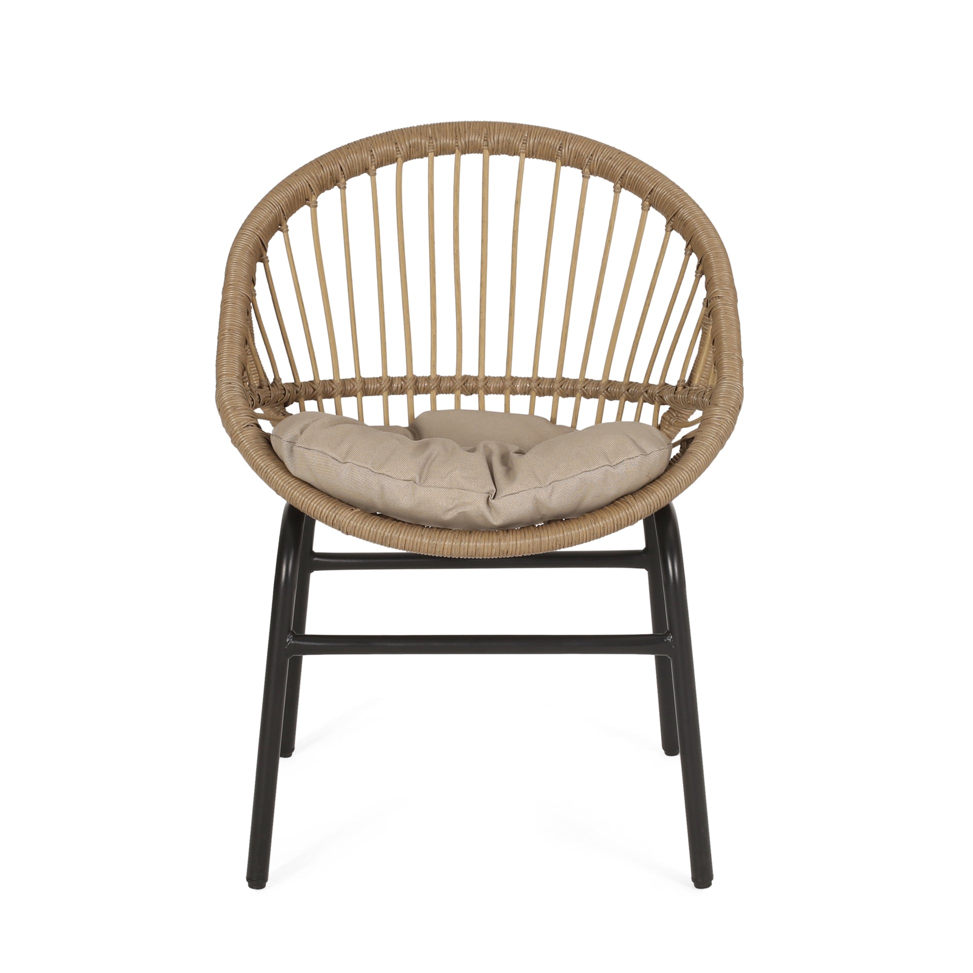 Wicker accent chair with beige cushion and black metal legs