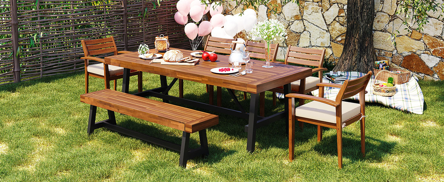 Wooden picnic table with chairs and bench set for outdoor dining