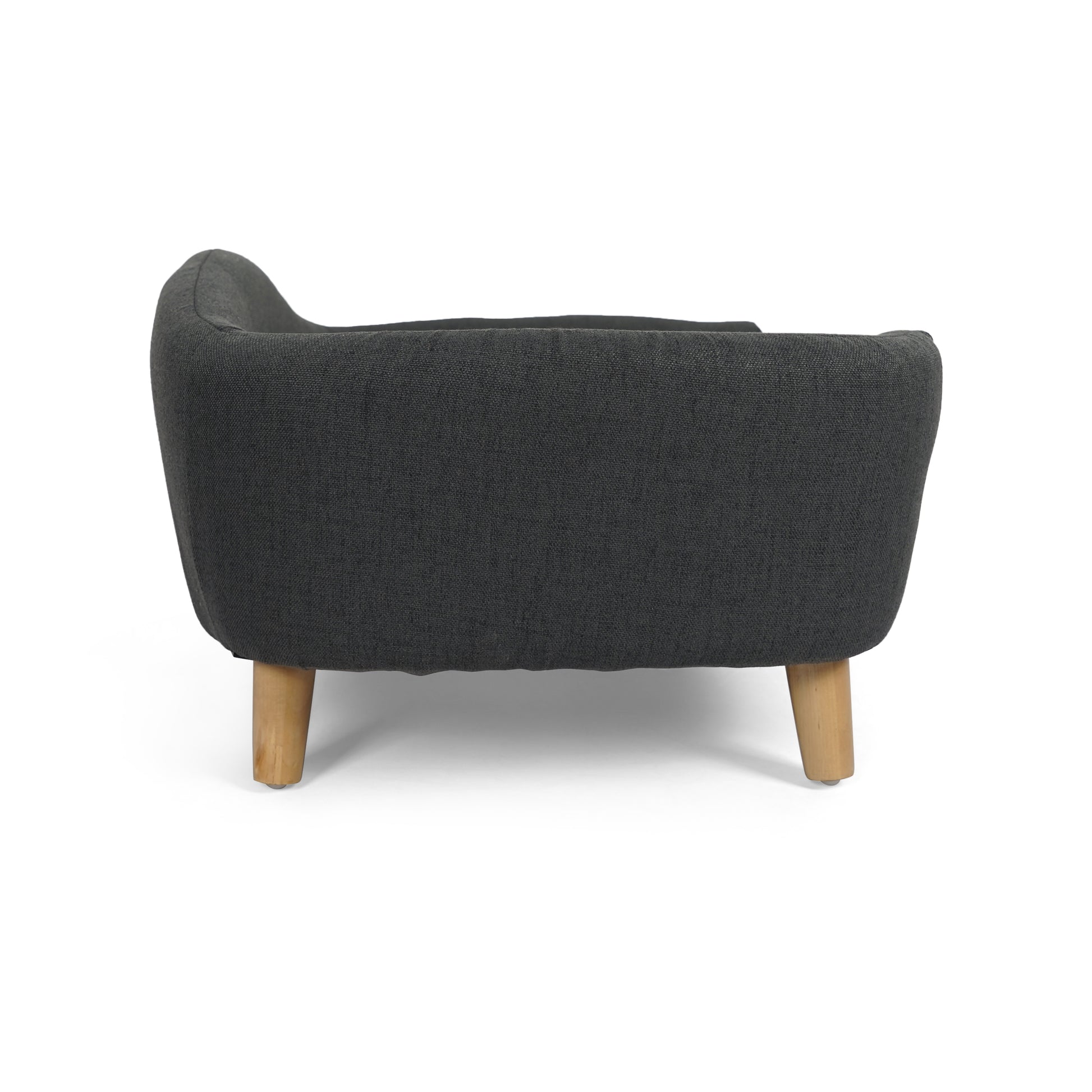 Dark grey upholstered armchair with tapered wooden legs