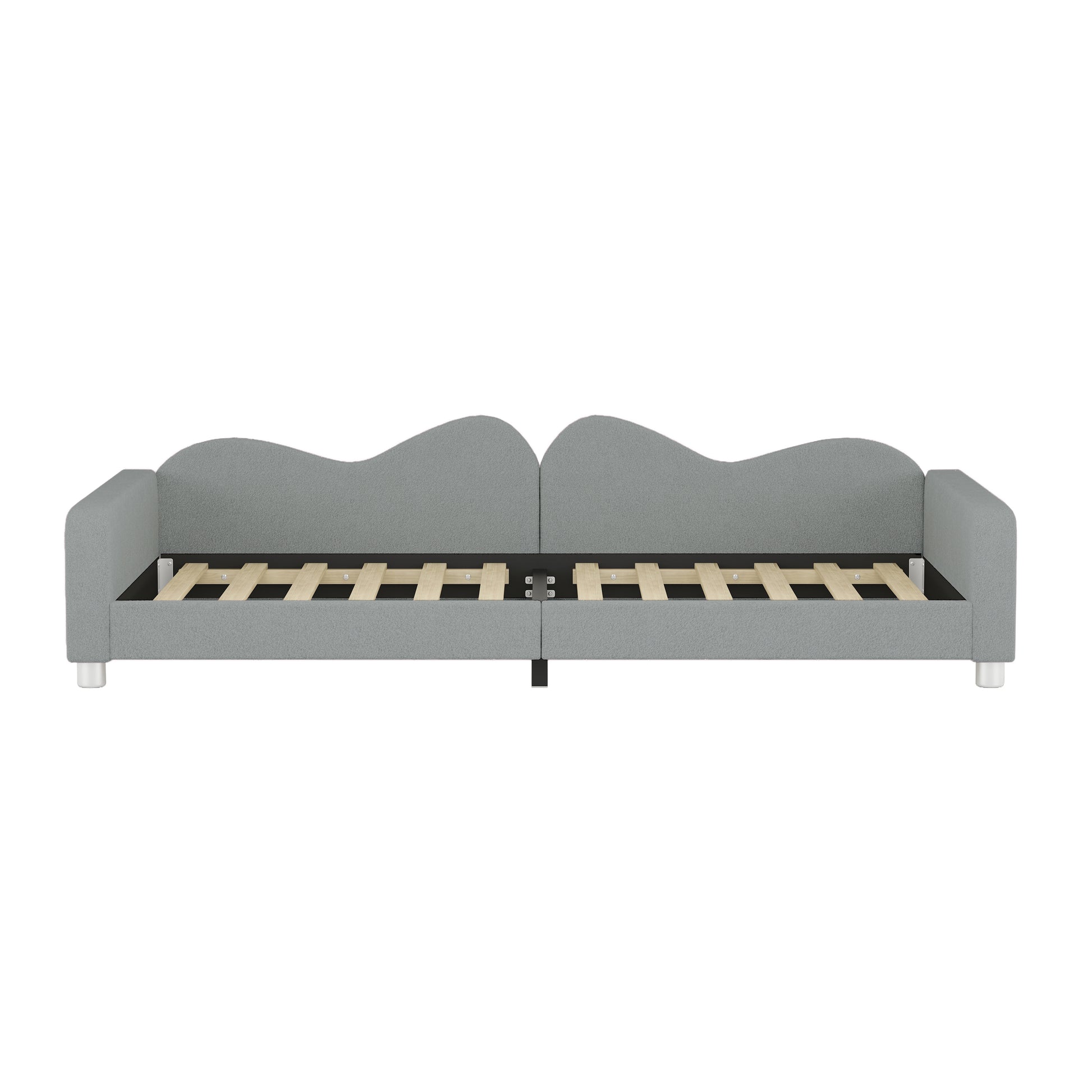 Gray fabric upholstered twin daybed with scalloped headboard and wooden slats for mattress support