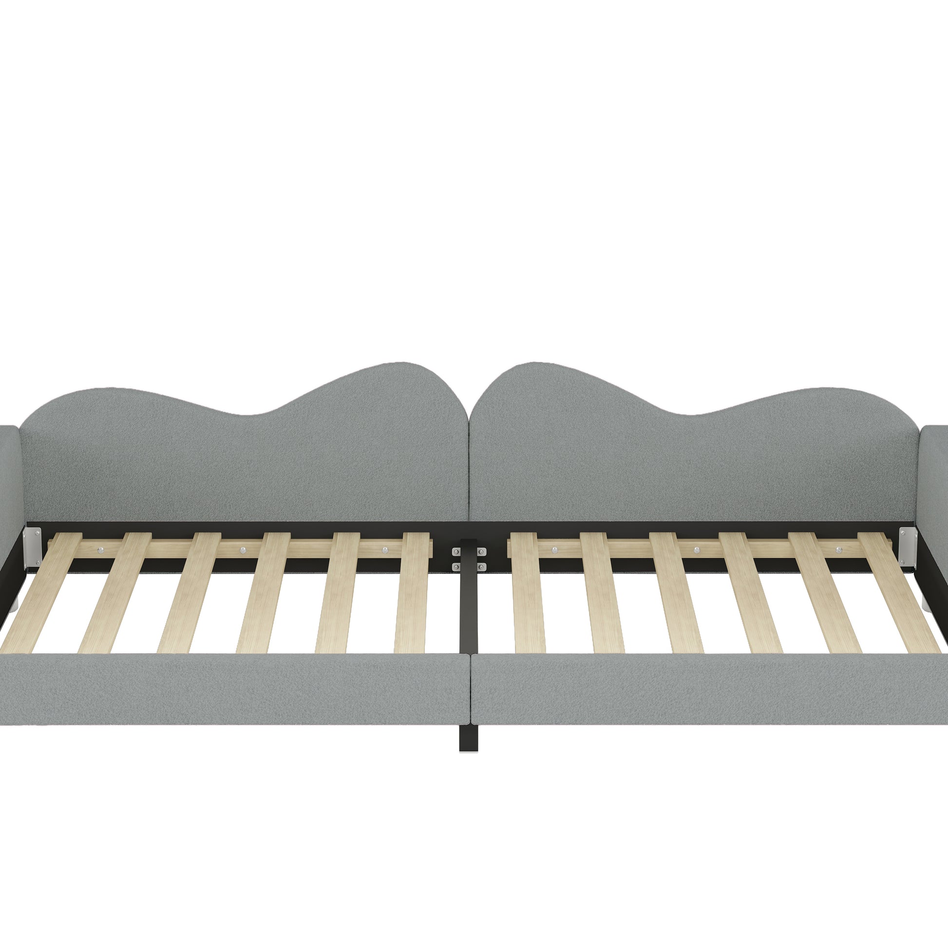 Gray fabric daybed with a waveshaped back and wooden slats