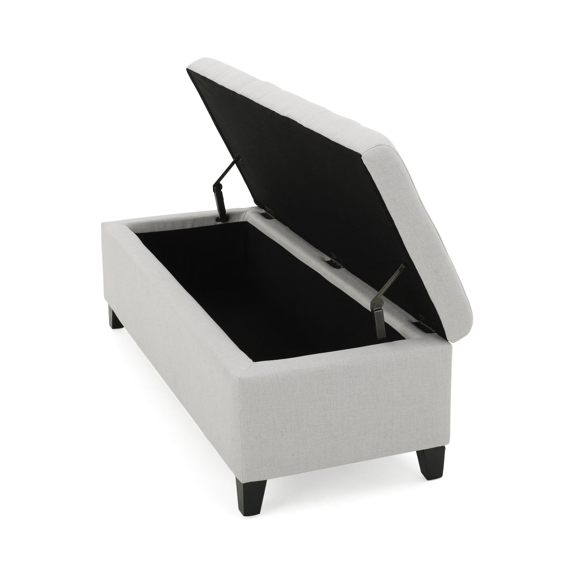 Light grey upholstered storage bench with lid open revealing dark interior