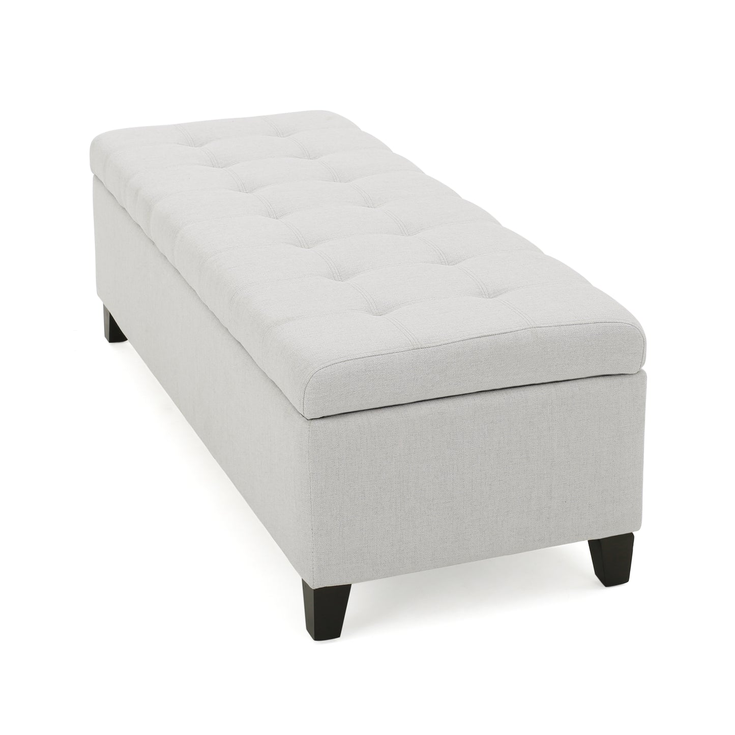 Light gray upholstered storage ottoman with tufted lid and dark wood legs