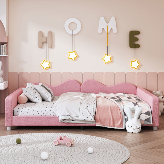 Pink toddler bed with plush upholstery and starshaped night lights