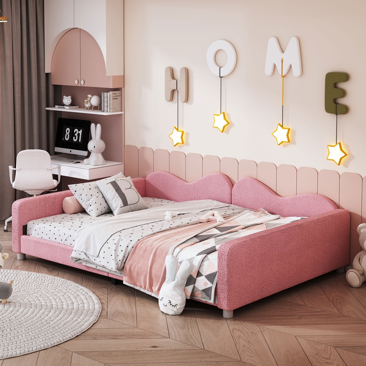 Pink upholstered twin bed with heartshaped headboard and playful bedding