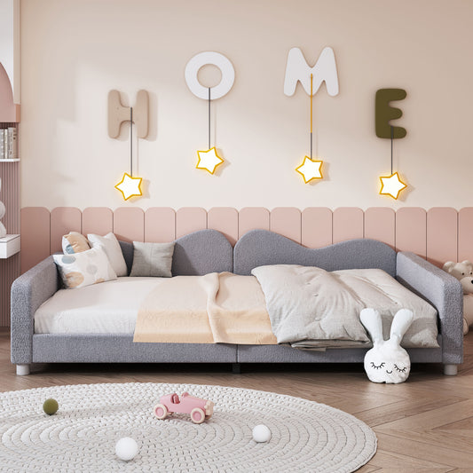 Cozy grey boucle toddler daybed with playful wave headboard and star lights