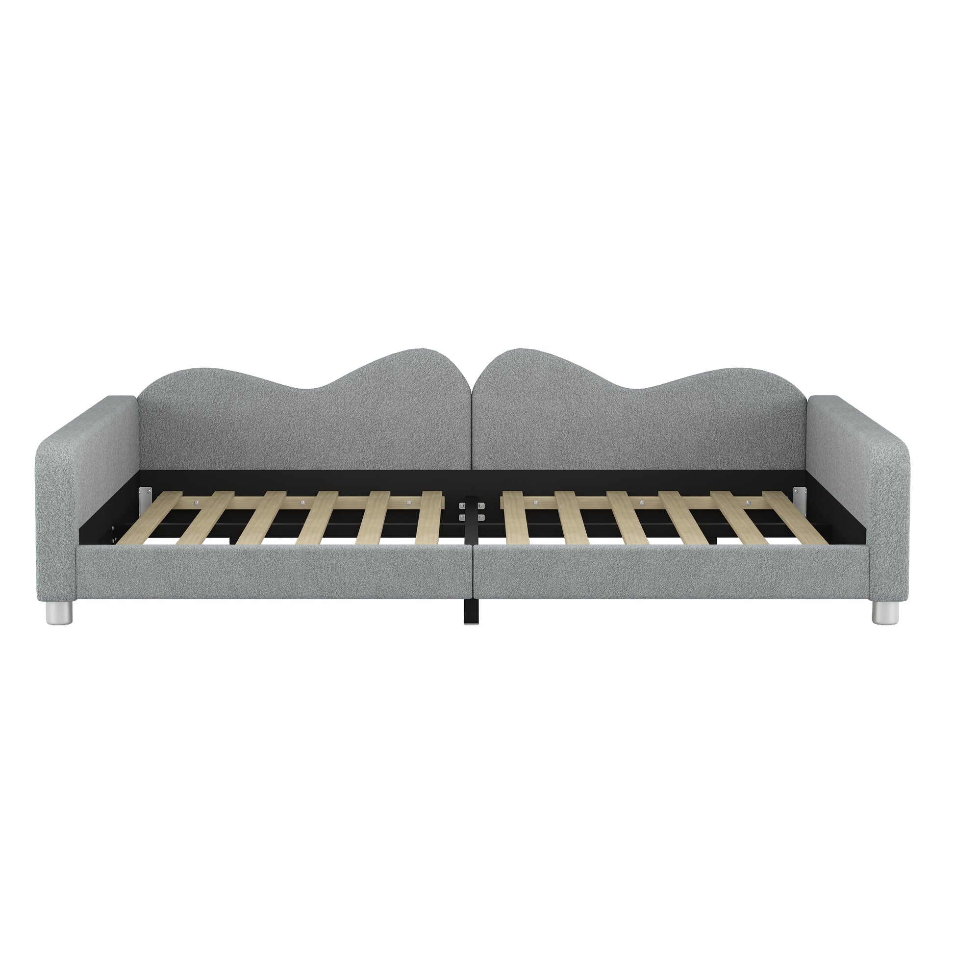 Grey fabric upholstered daybed with wavy headboard and wooden slat support