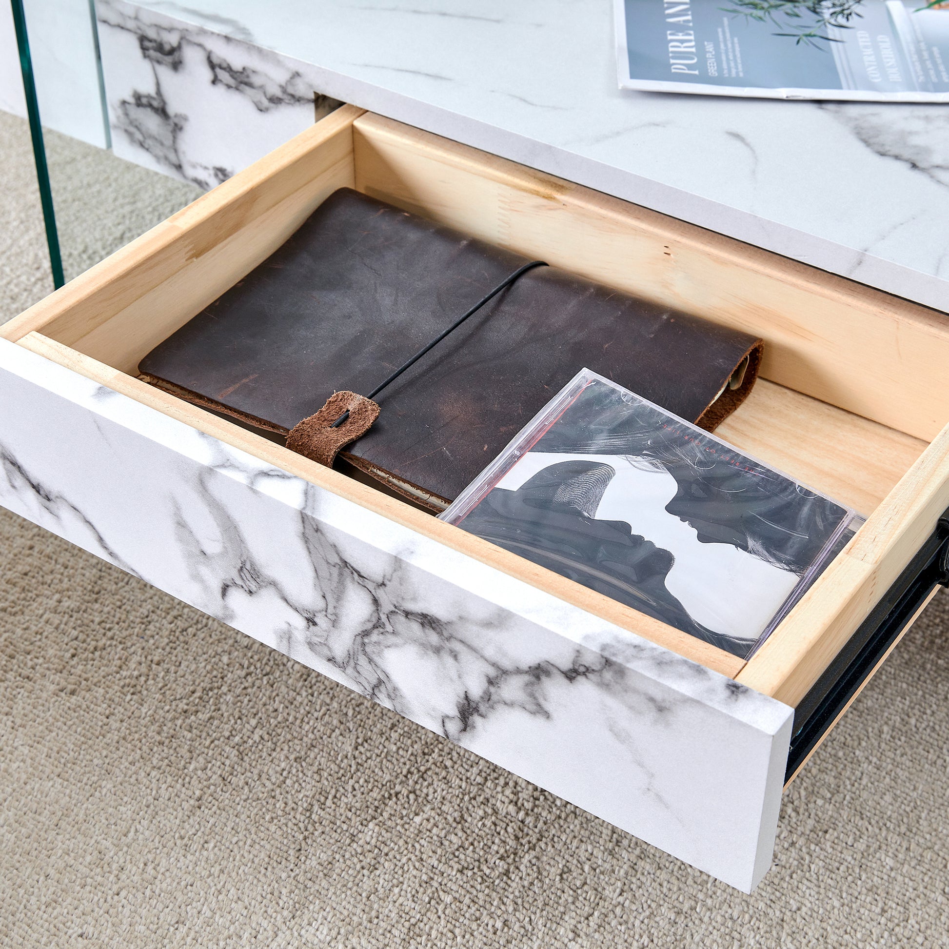 Marble effect drawer with leather journal and CD case