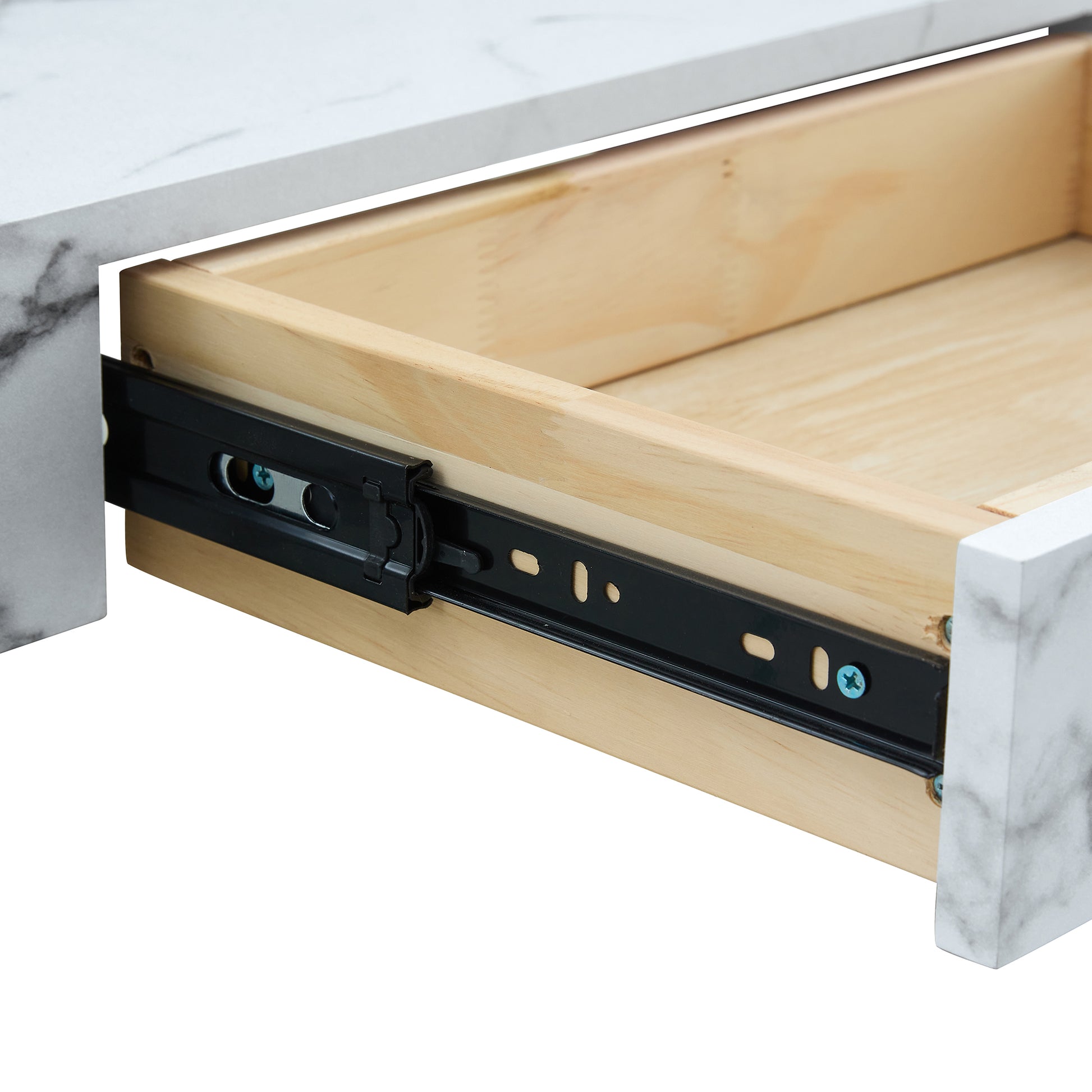 Closeup of a marblefinish drawer front with black metal drawer slides