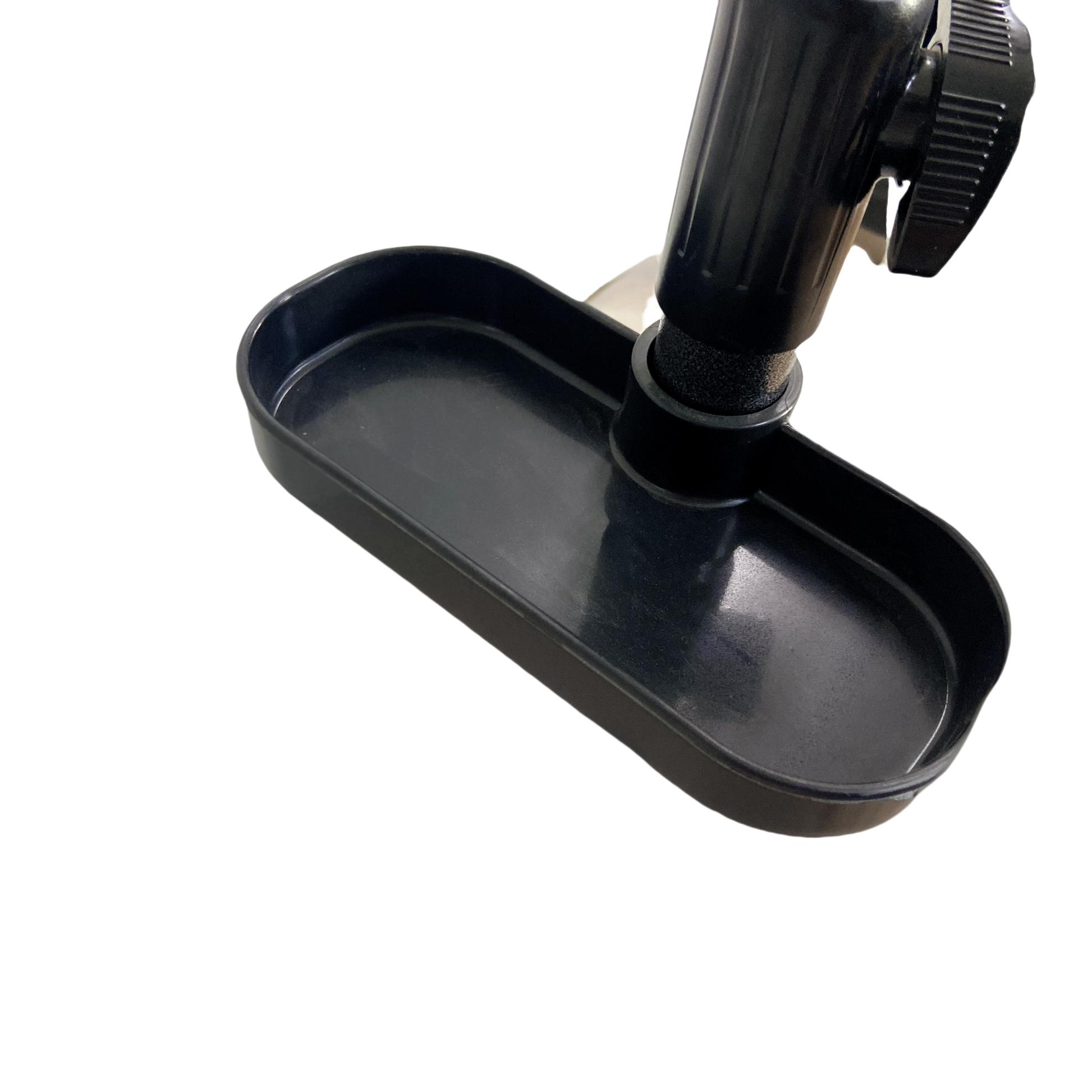 Black plastic tray attachment with adjustable knob for stroller or car seat accessory