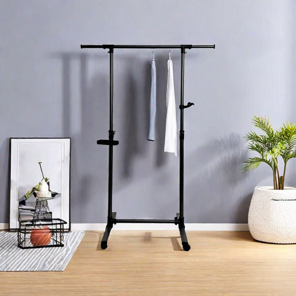 Black metal doublerod garment rack with hanging clothes