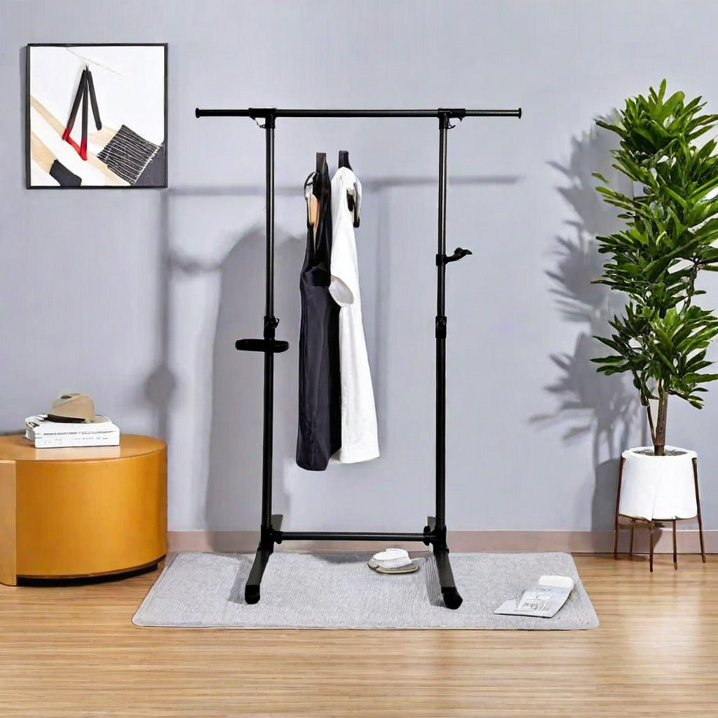 Black metal garment rack with adjustable height for clothes