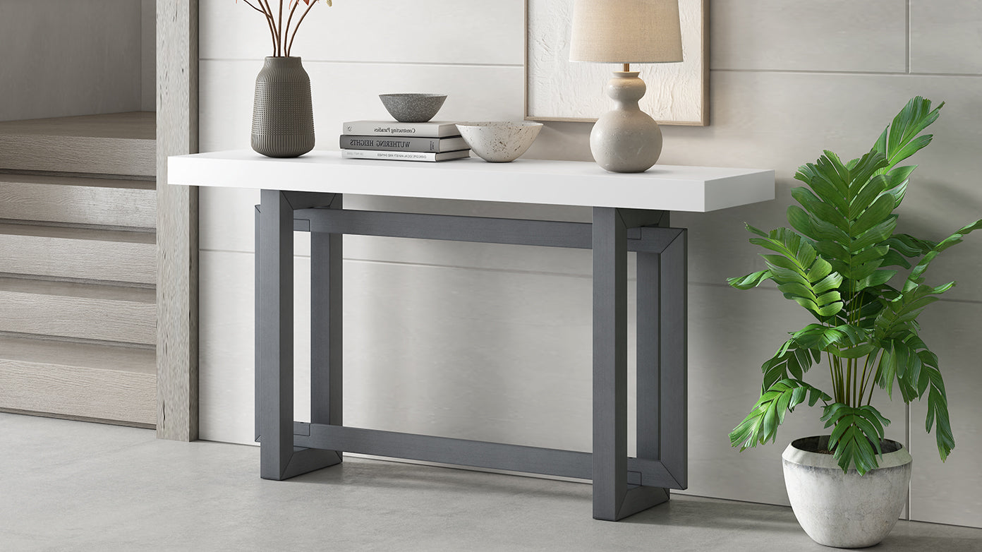 White top modern console table with dark gray geometric base
