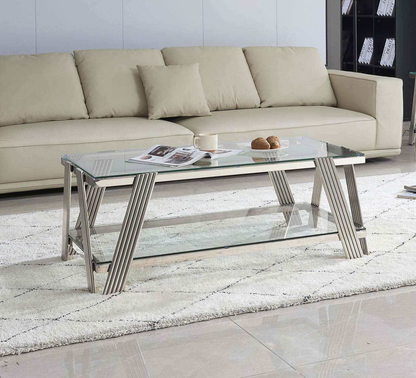 Modern glass coffee table with silver chrome legs and two tiers