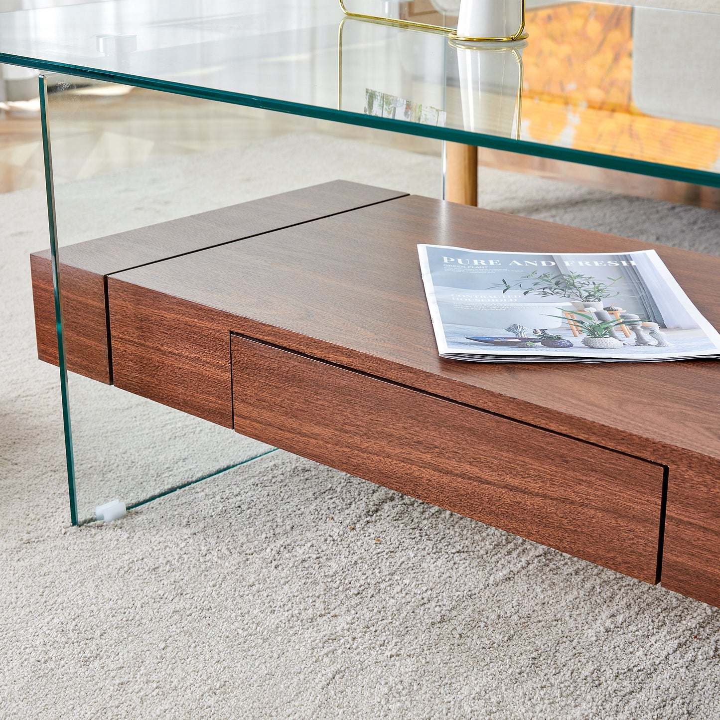 Modern walnut coffee table with glass top and drawer