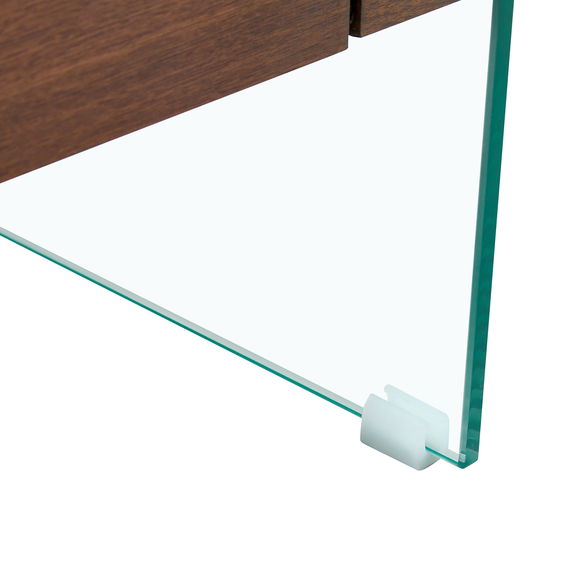 Closeup of a walnutfinished wooden shelf edge with a clear tempered glass shelf below