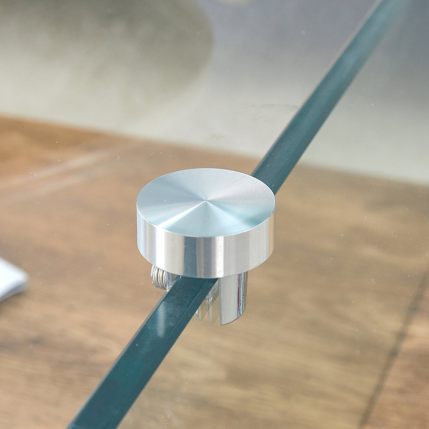 Circular brushed aluminum standoff fitting for glass panels