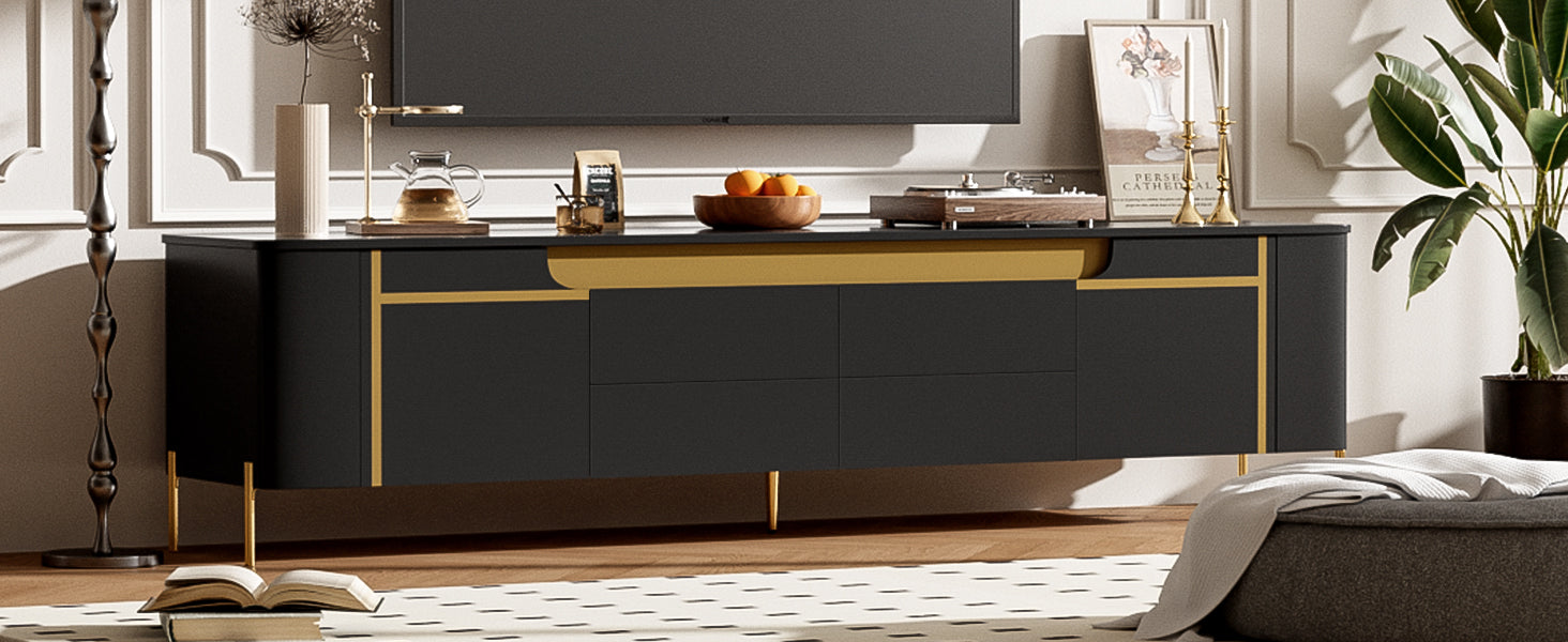 Sleek black media console with gold accents and tapered legs