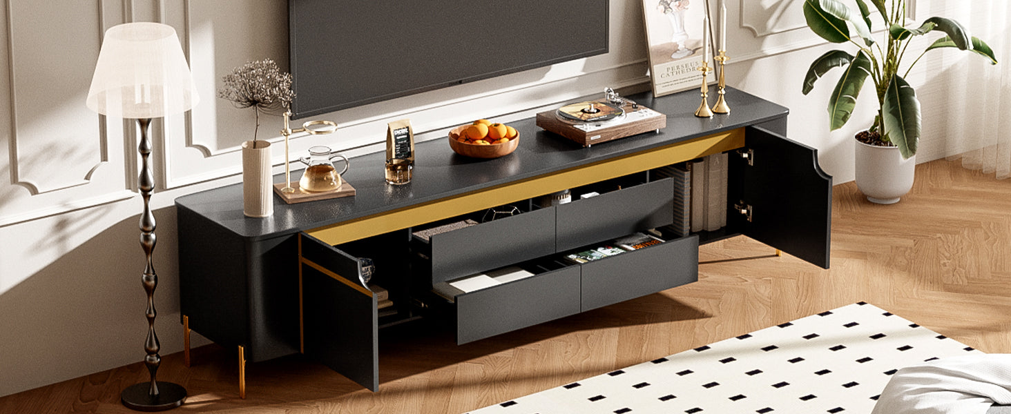 Modern dark grey media console with gold accents and open storage