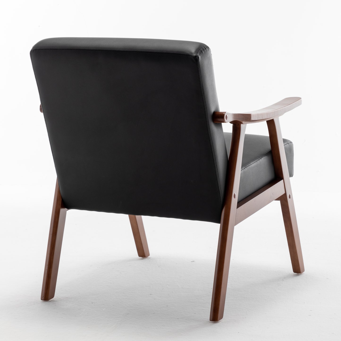 Black leather armchair with wooden frame and armrests