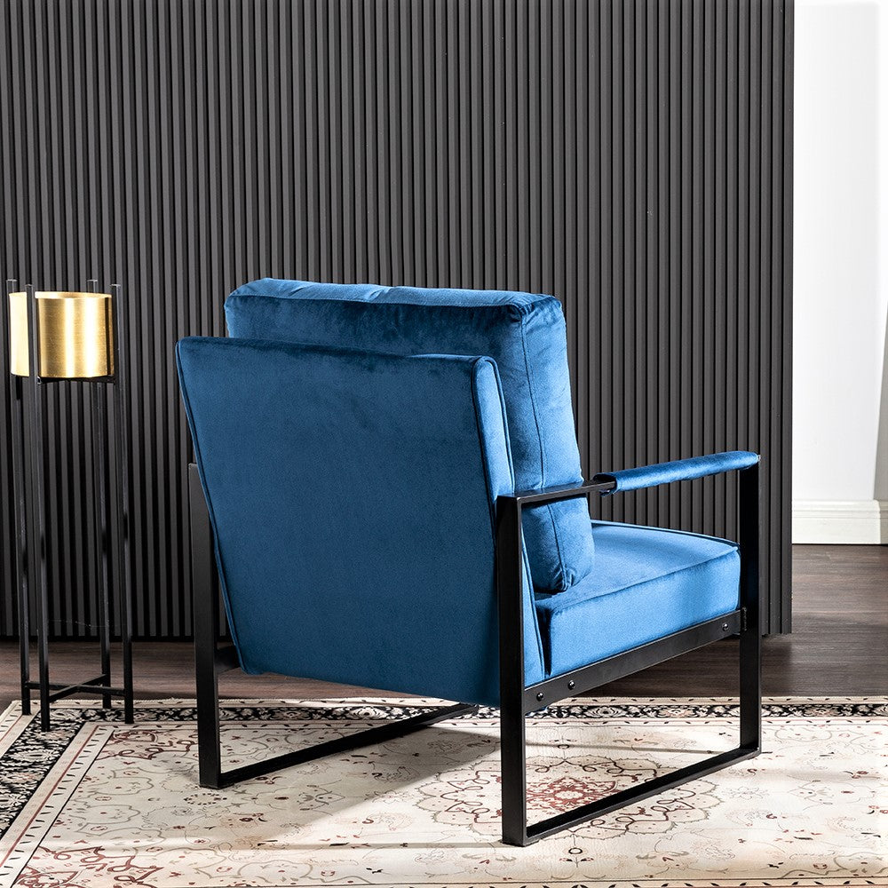 Modern blue velvet armchair with black metal frame plush seating ideal accent chair for living rooms