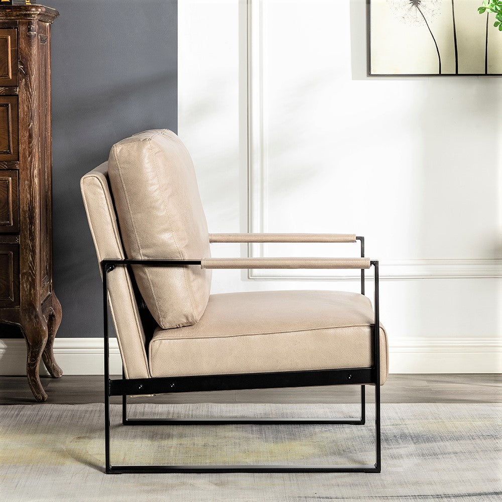 Tan leather armchair with black metal frame and arms