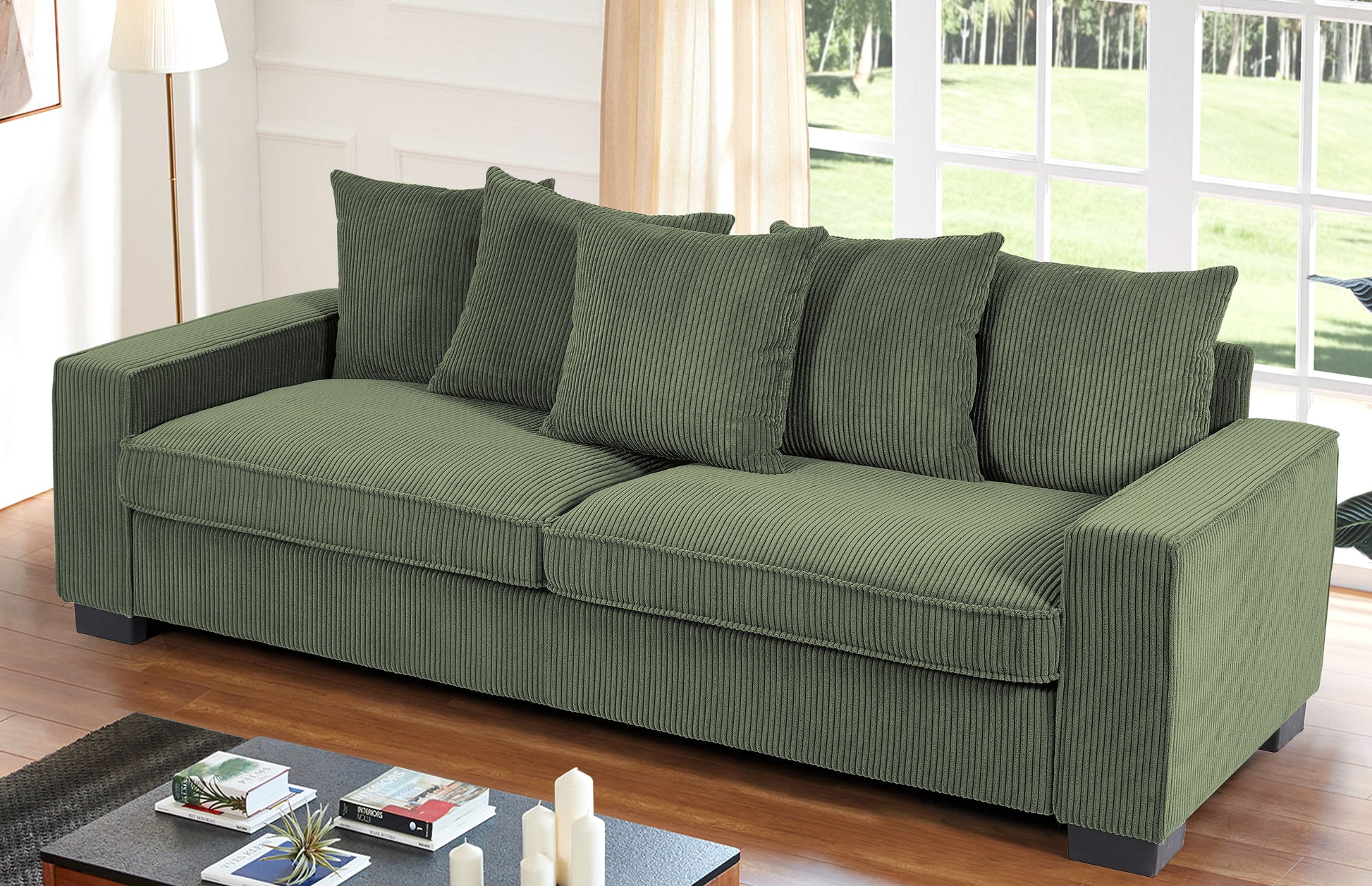 Green corduroy sofa with plush cushions