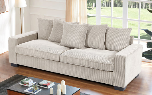 Beige corduroy sofa with plush cushions