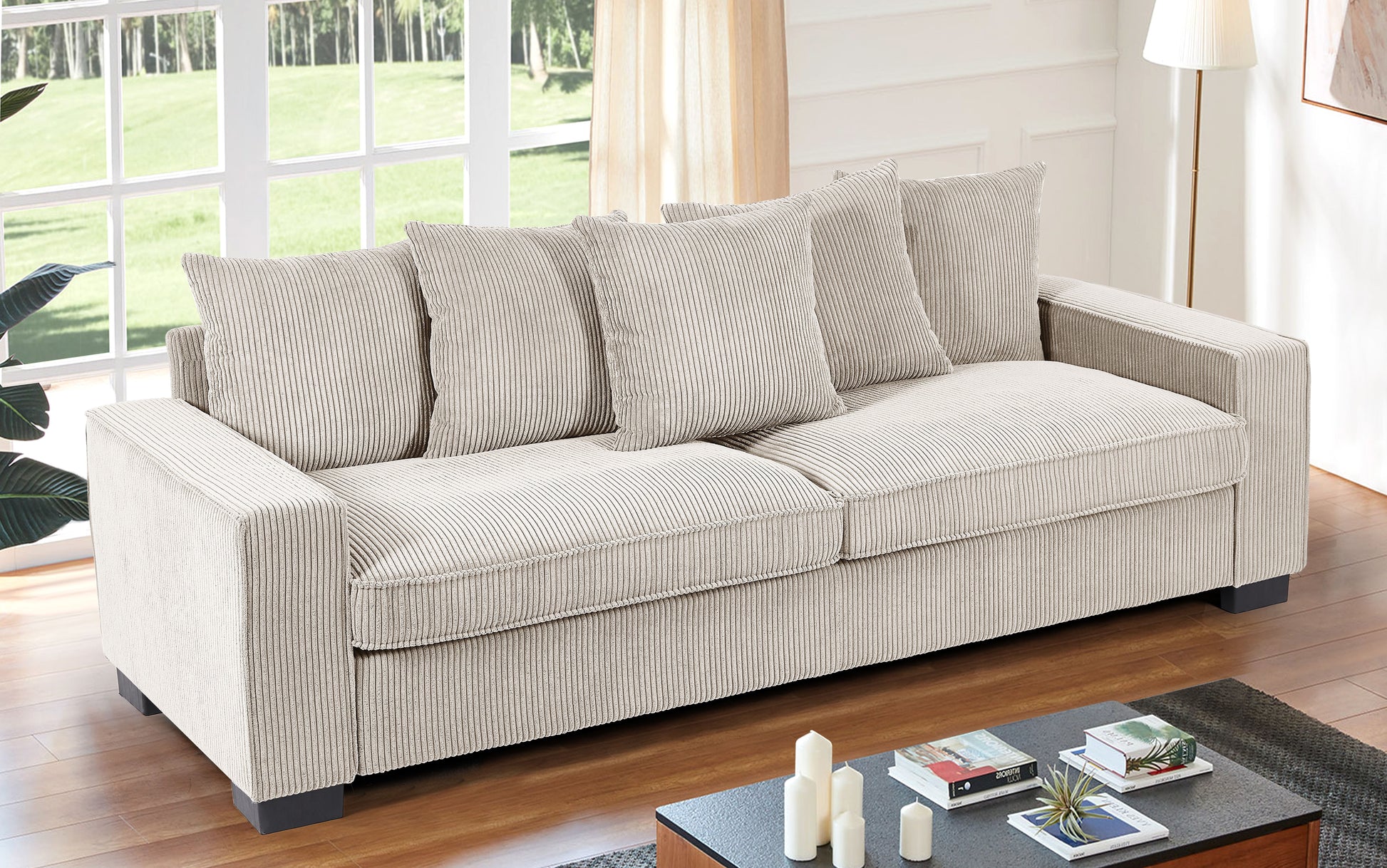 Beige corduroy fabric sofa with plush cushions and a modern lowprofile design