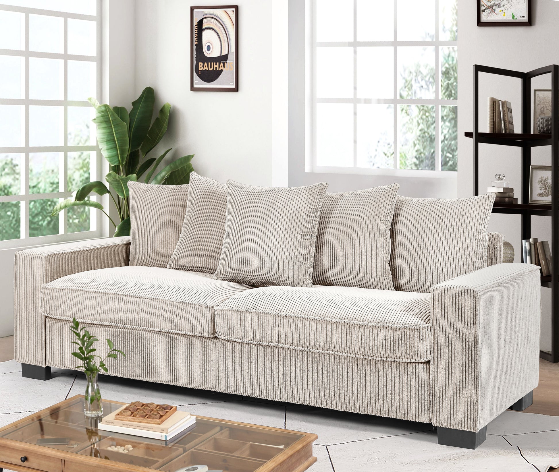 Beige corduroy sofa with plush cushions and square armrests