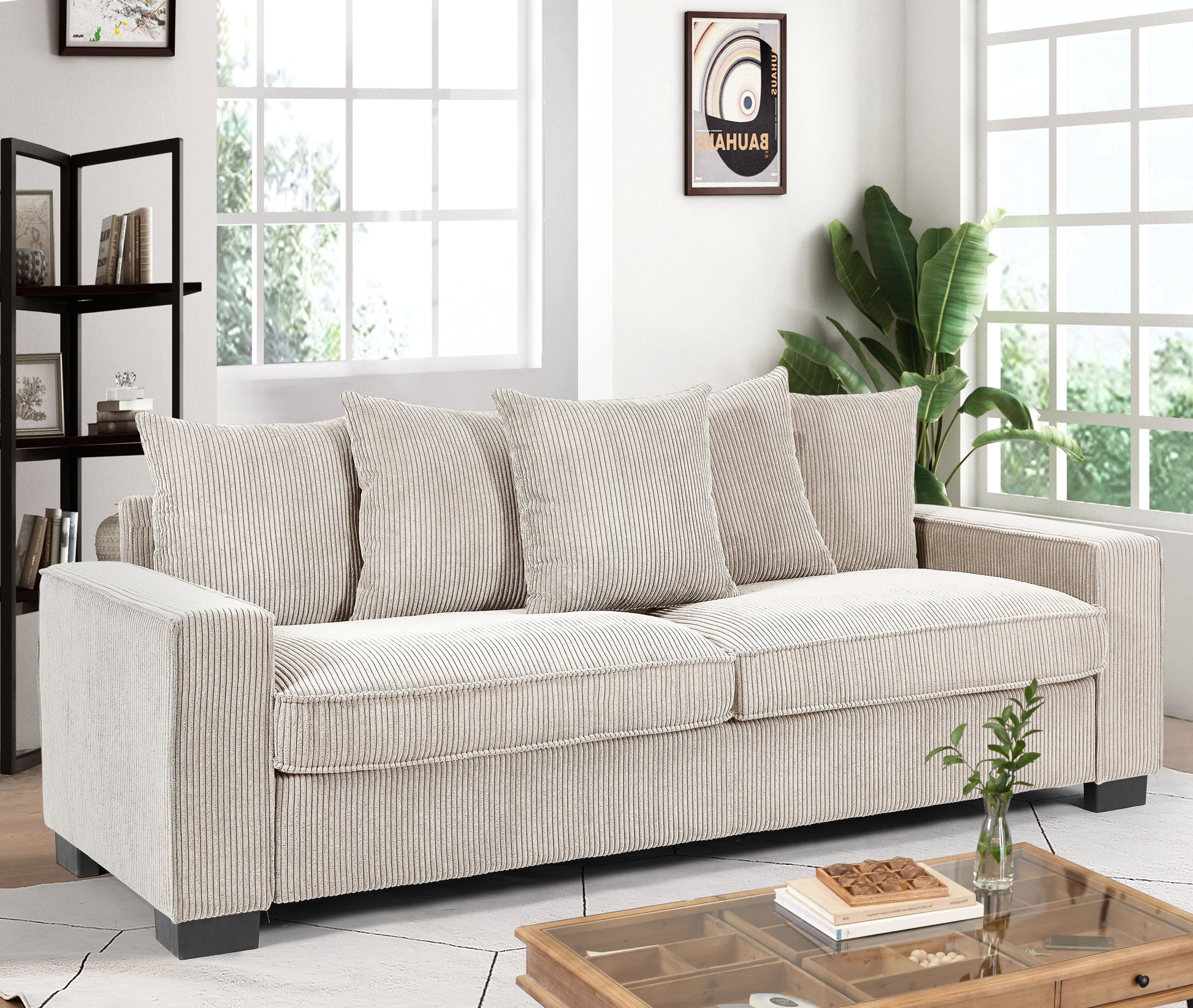 A cozy beige corduroy sofa with plush cushions and dark wooden legs perfect for a modern living room