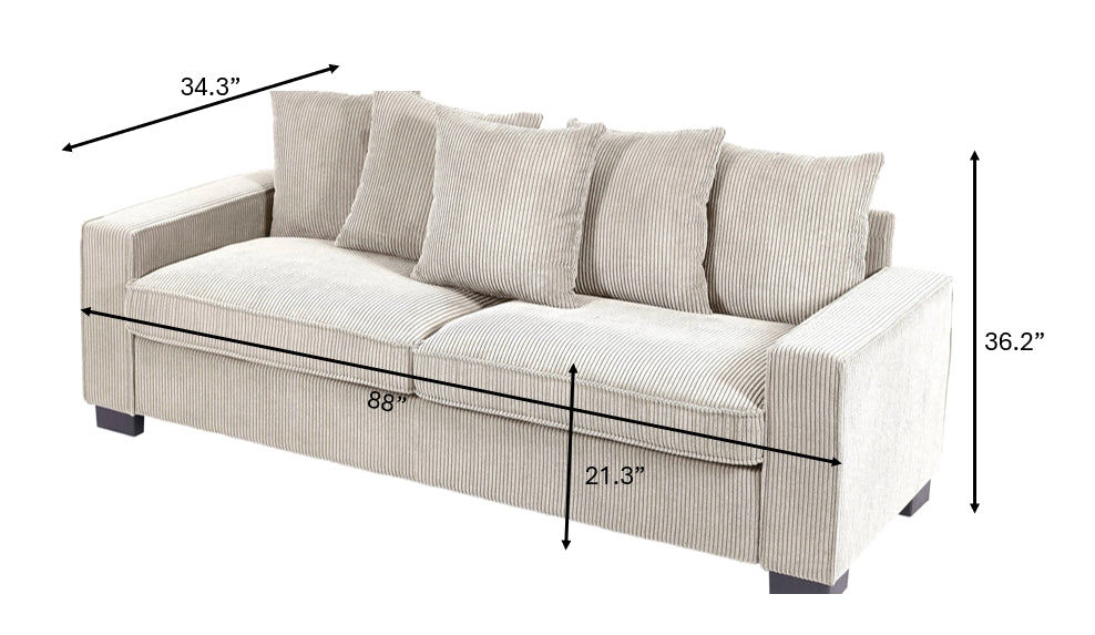 Beige corduroy sofa with four accent pillows and black block feet