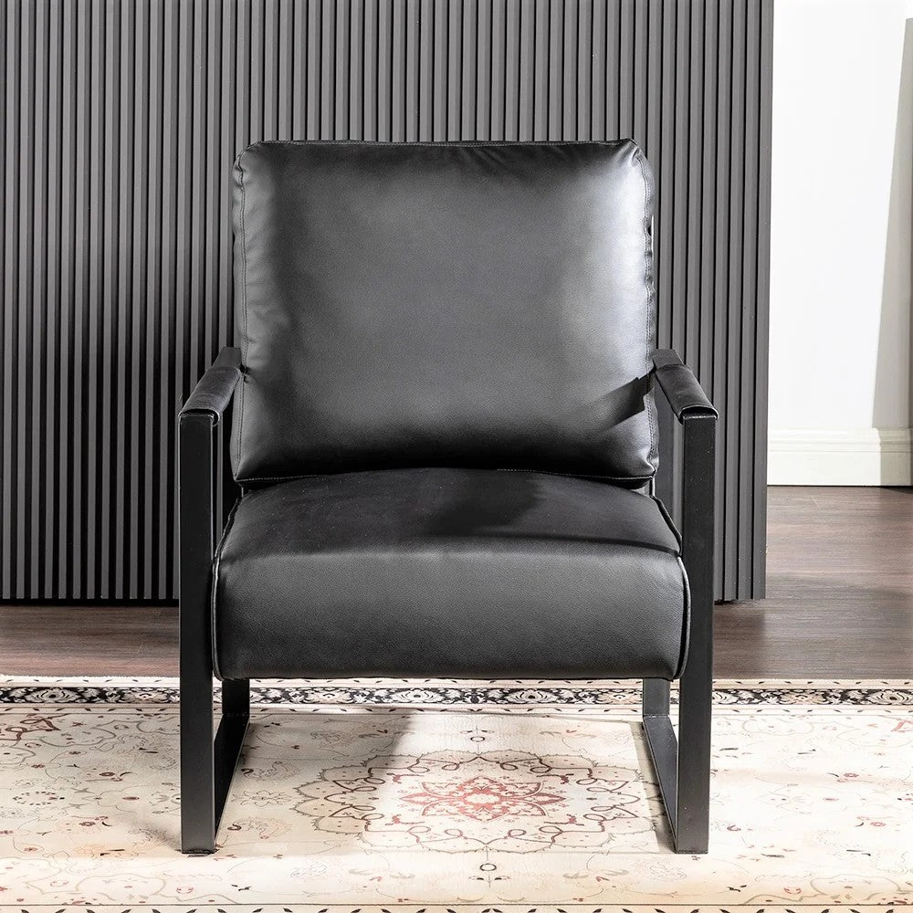 Black leather accent chair with sleek metal frame and plush seat cushions