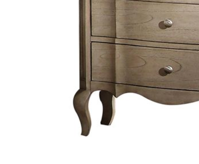 Gray wood chest of drawers with curved legs and silver knobs
