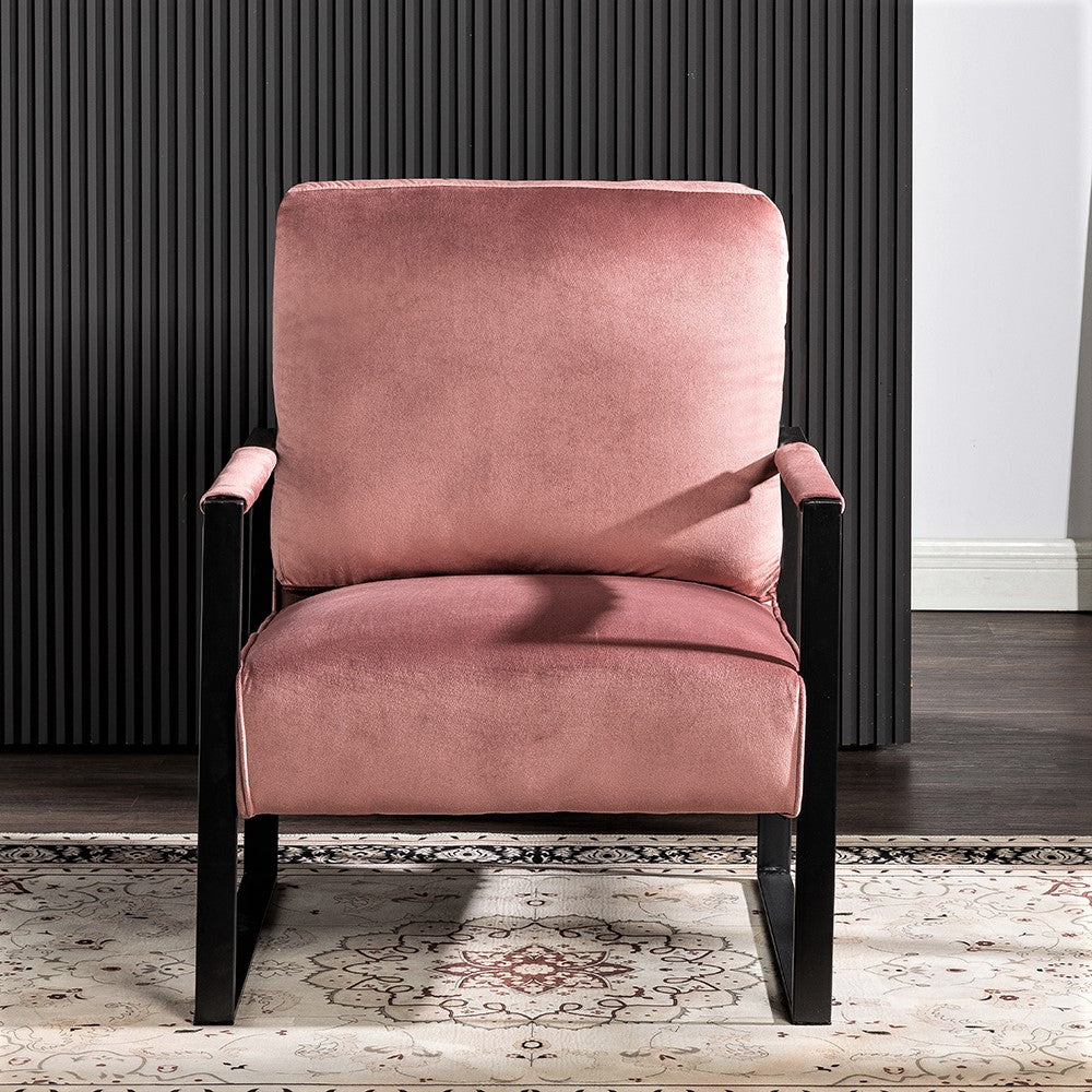 Pink velvet accent chair with black metal frame
