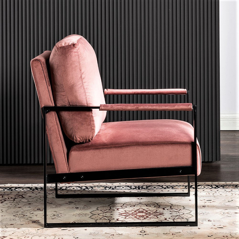 Dusty rose velvet accent chair with black metal frame and arms