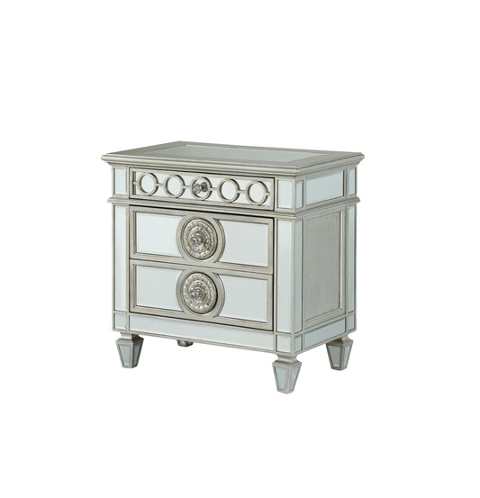 Glamorous mirrored nightstand with silver accents and crystal drawer pulls