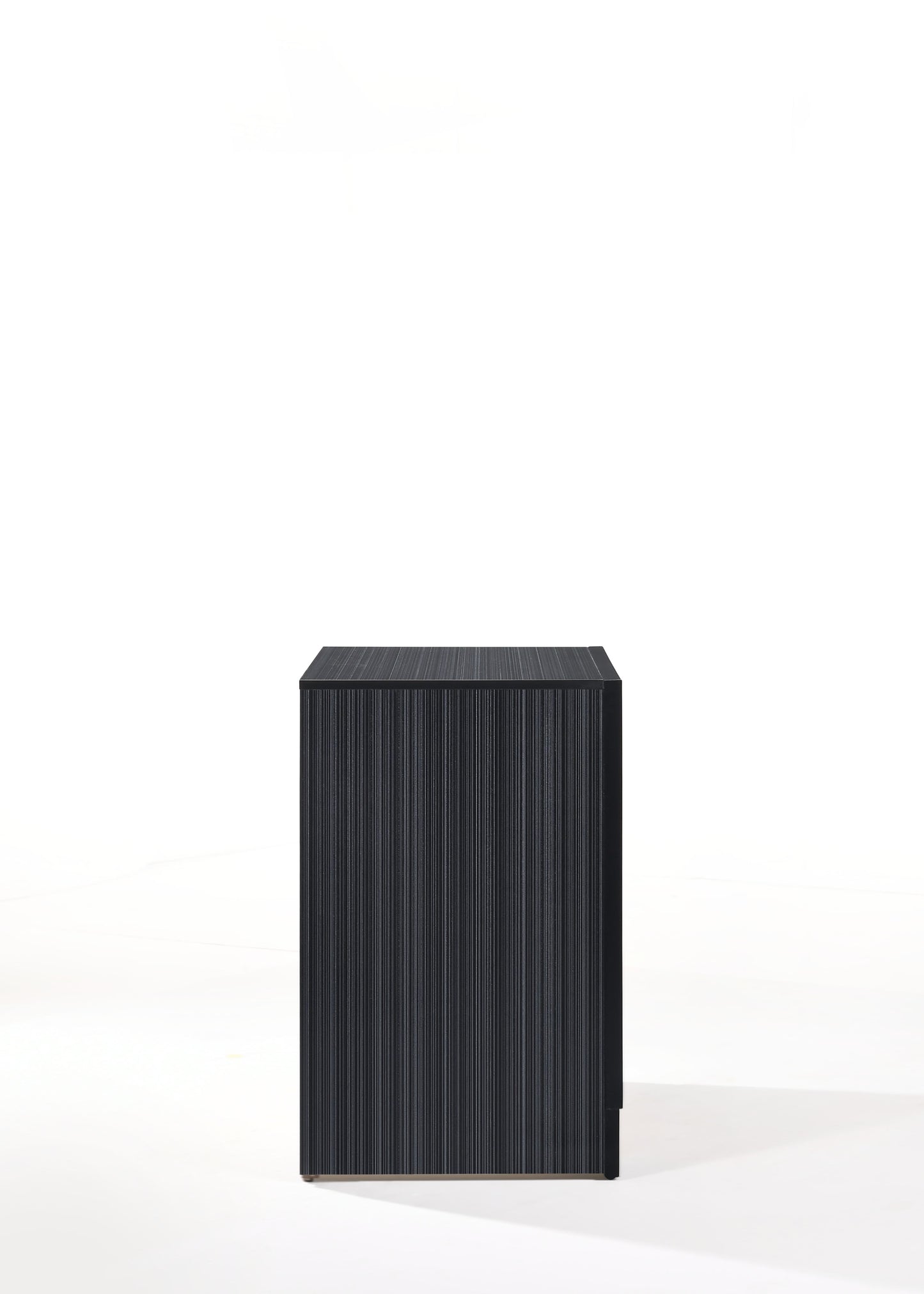 Sleek black minimalist nightstand with vertical ribbed texture