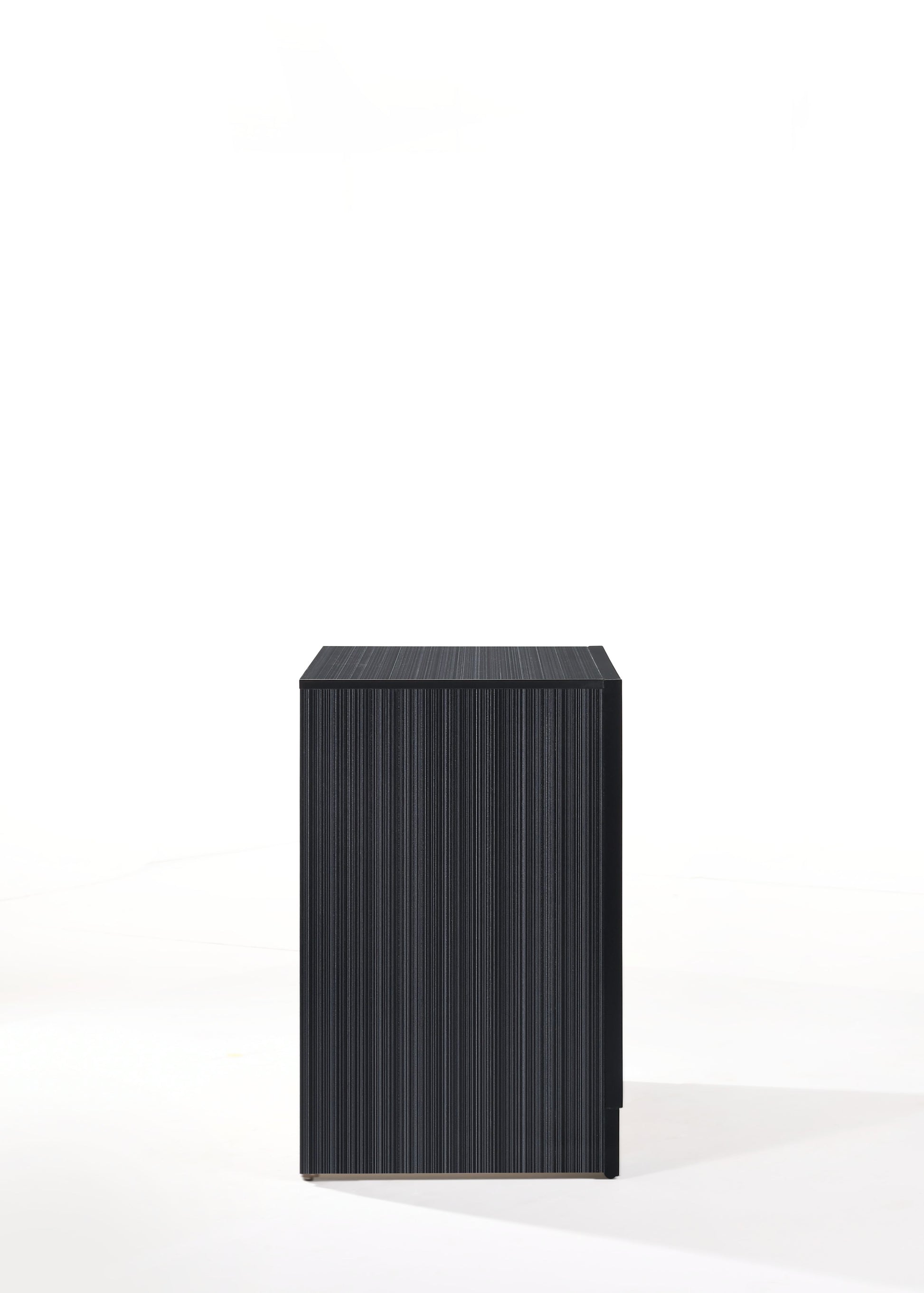 Sleek black minimalist nightstand with vertical ribbed texture