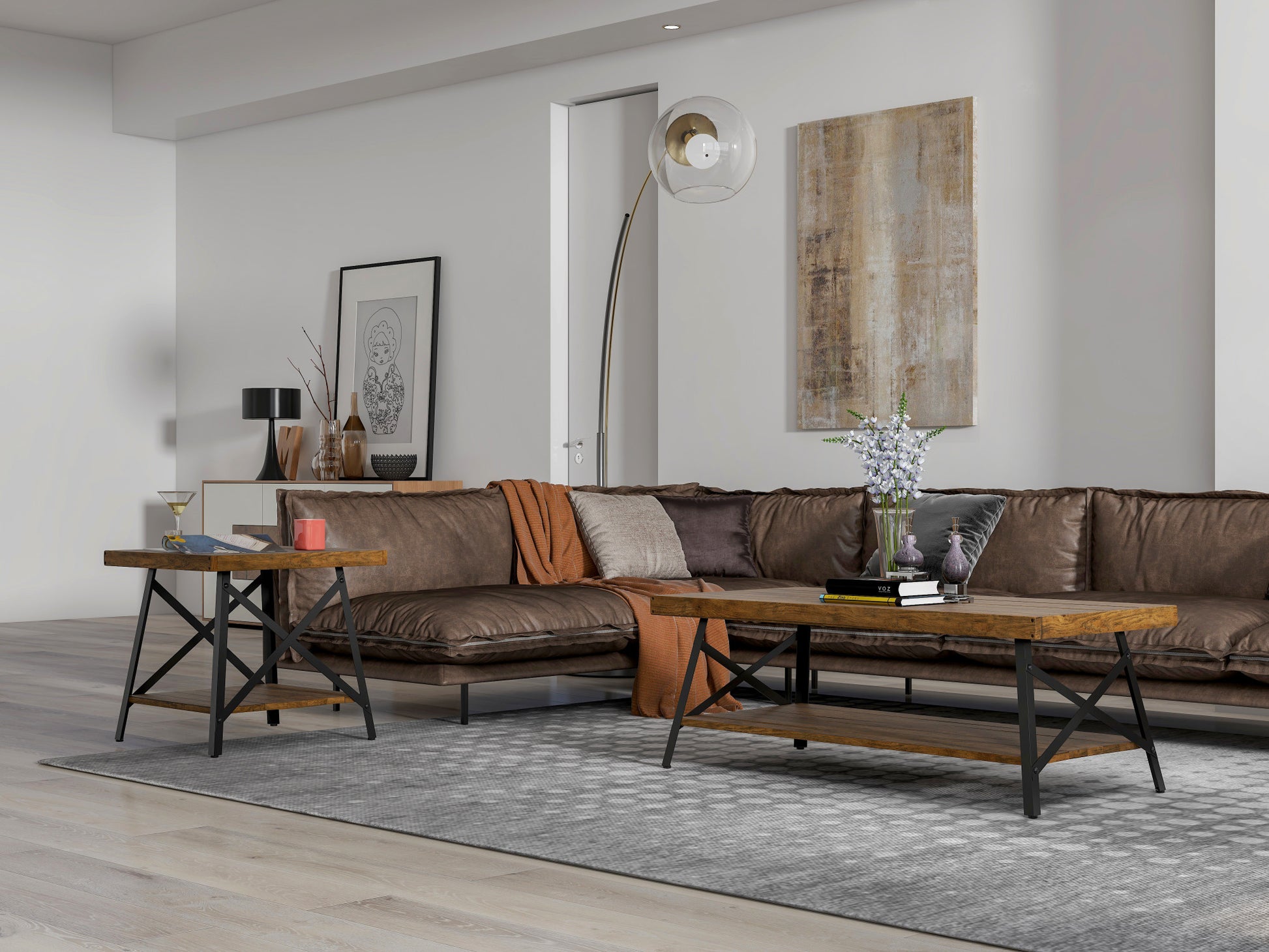 Brown leather sectional sofa with throw pillows and blankets