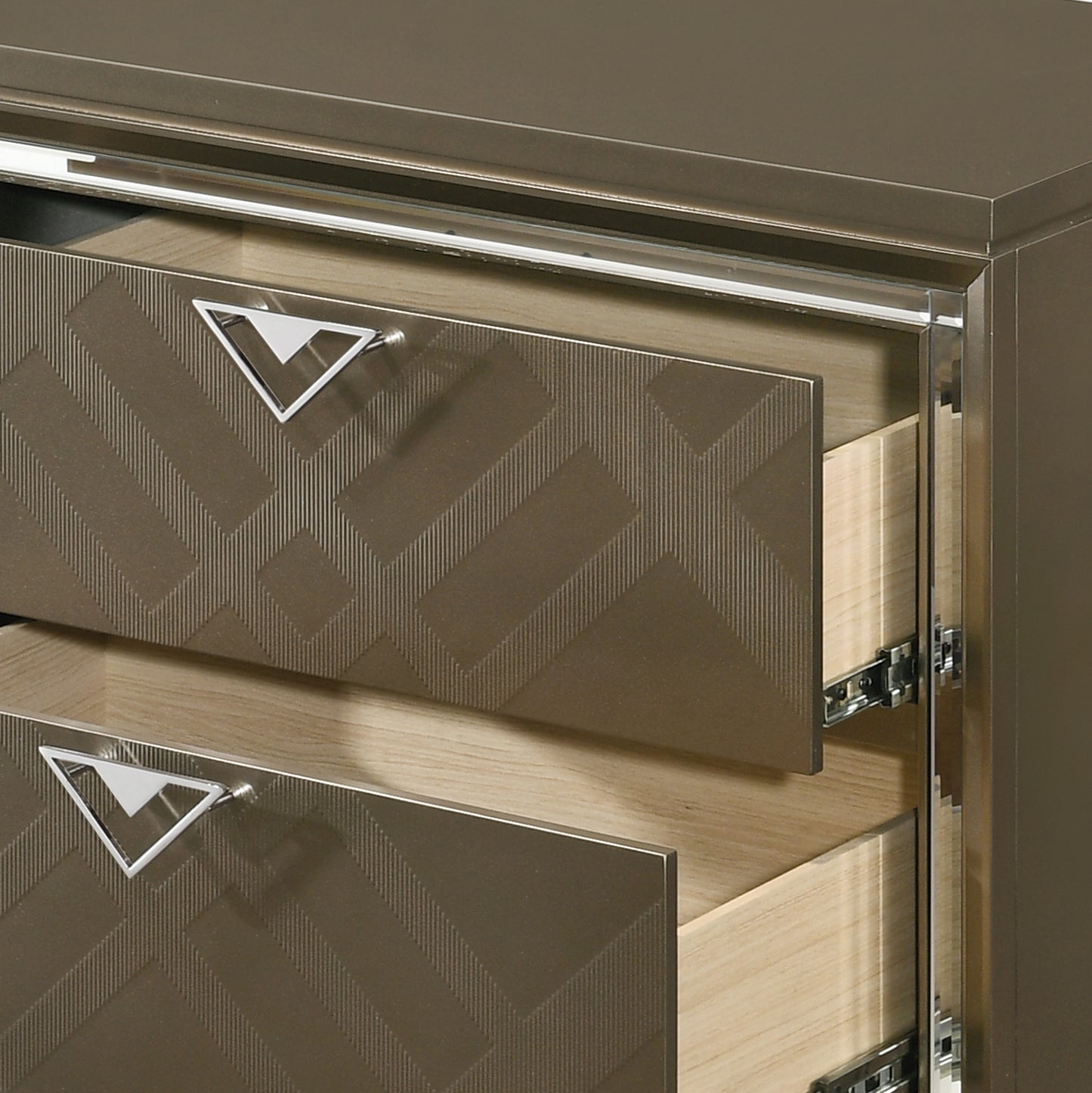 Bronze dresser with geometric pattern drawers and chrome triangle pulls