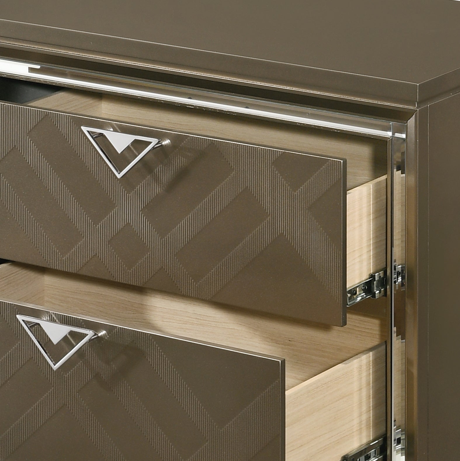 Bronze dresser with geometric pattern drawers and chrome triangle pulls