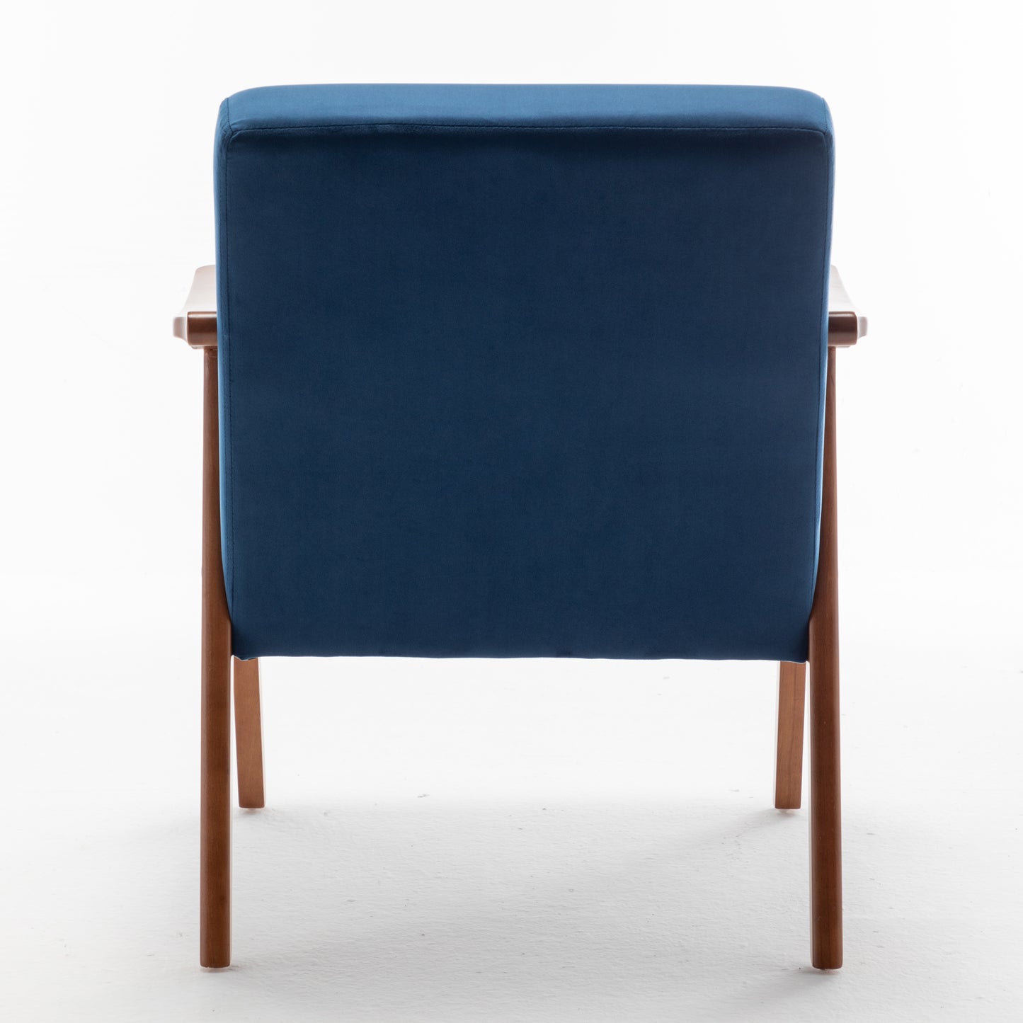 Back view of navy blue upholstered armchair with wooden frame