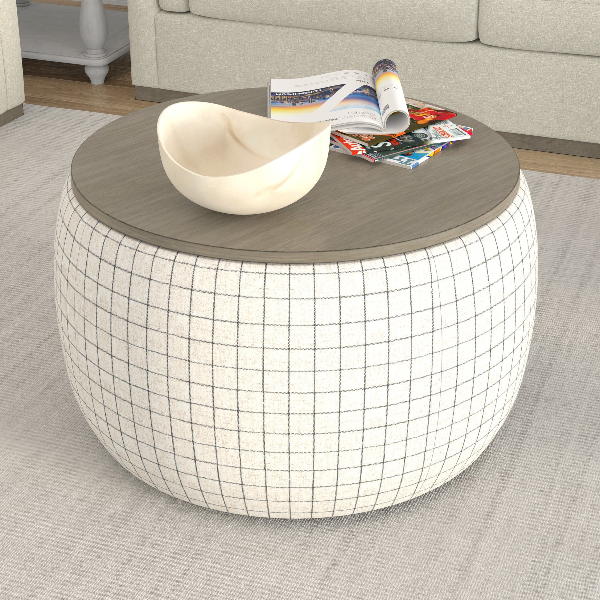 Round plaid ottoman coffee table with wood top and decorative bowl