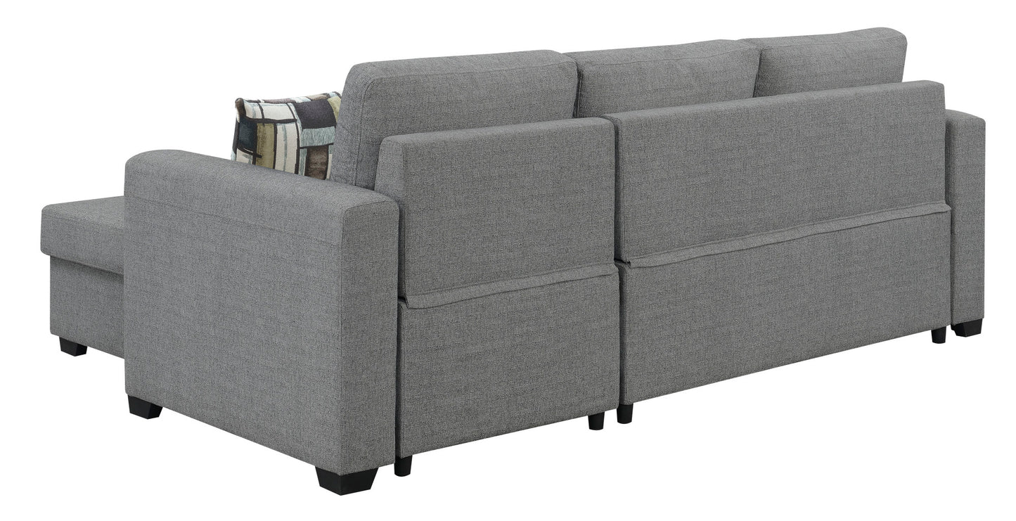 Gray fabric sectional sofa with textured upholstery and geometric throw pillow