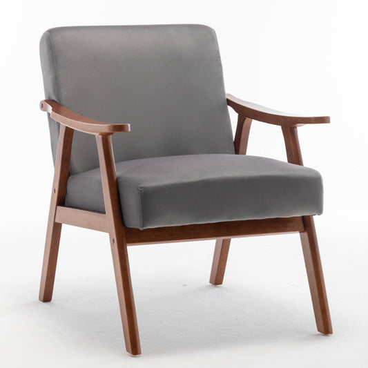 Gray velvet accent chair with wooden arms and legs