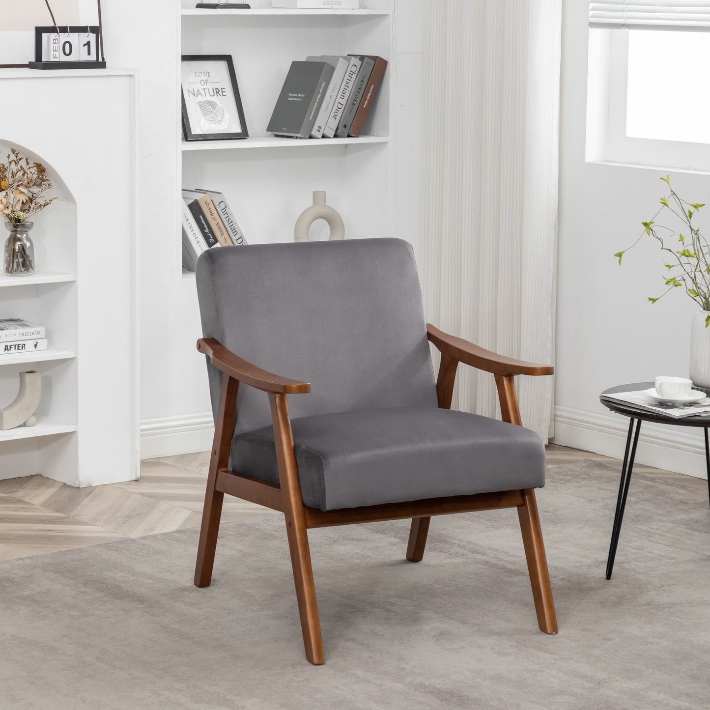 Comfortable grey velvet accent chair with solid wood legs