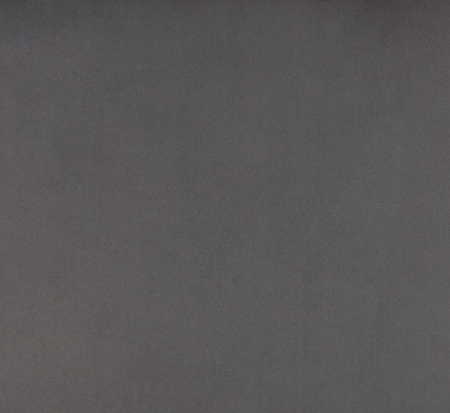 Dark charcoal grey textured fabric swatch for upholstery