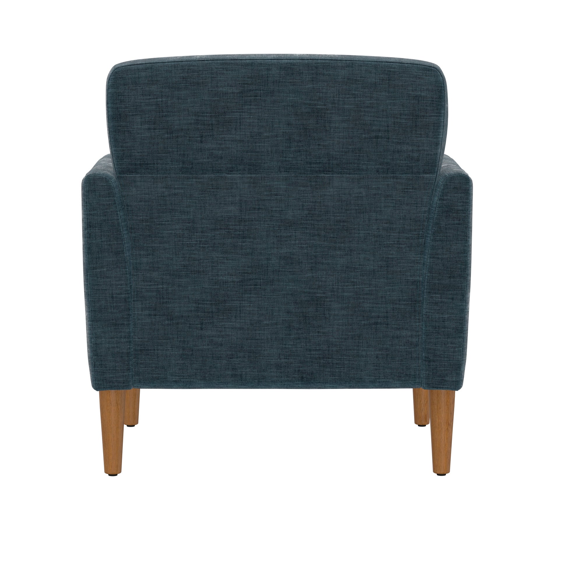 Back view of a navy blue fabric armchair with tapered wooden legs